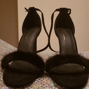 Black strappy furry pumps